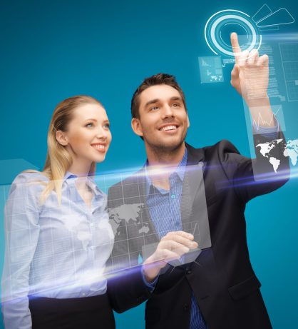 man and woman working with virtual touch screens picture of man and woman working with virtual touch screens